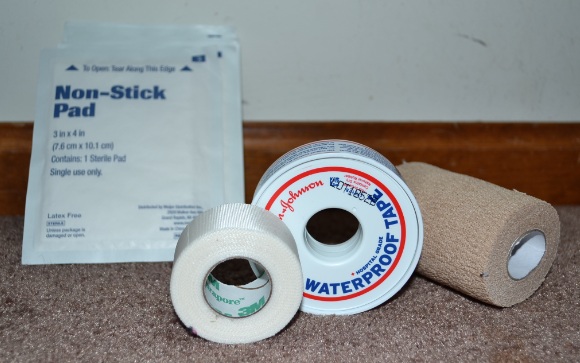 non-stick pad, gauze, waterproof tape, self-adhering wrap.jpg