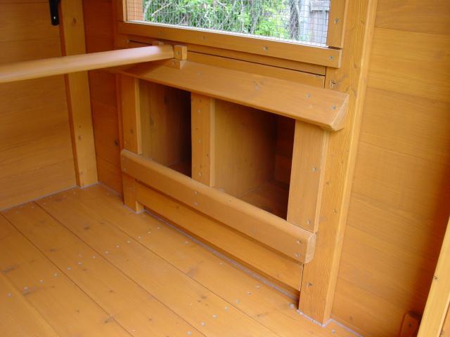66725_the_finished_inside_of_the_chicken_coop_with_roosts_04-18-10_011.jpg